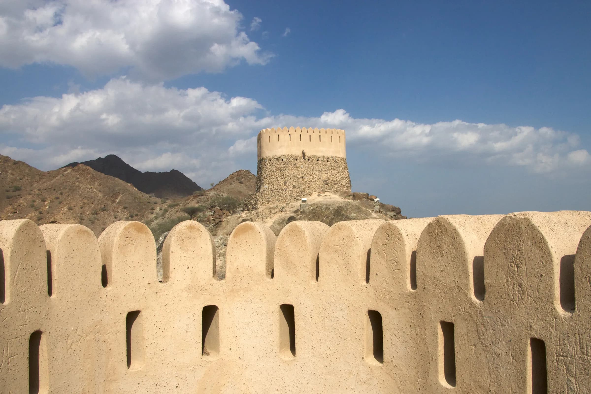 Historic watchtowers and fort walls in Fujairah